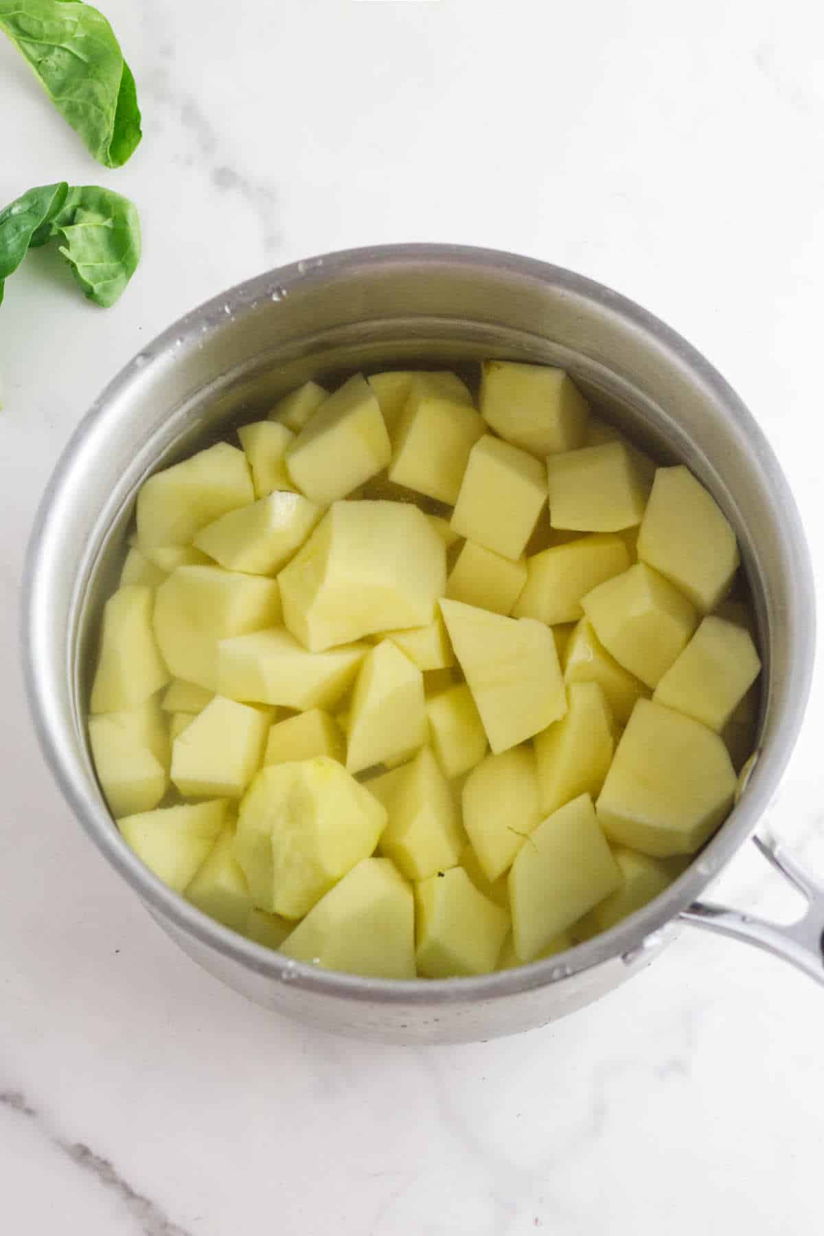 boiled potatoes in a pot.
