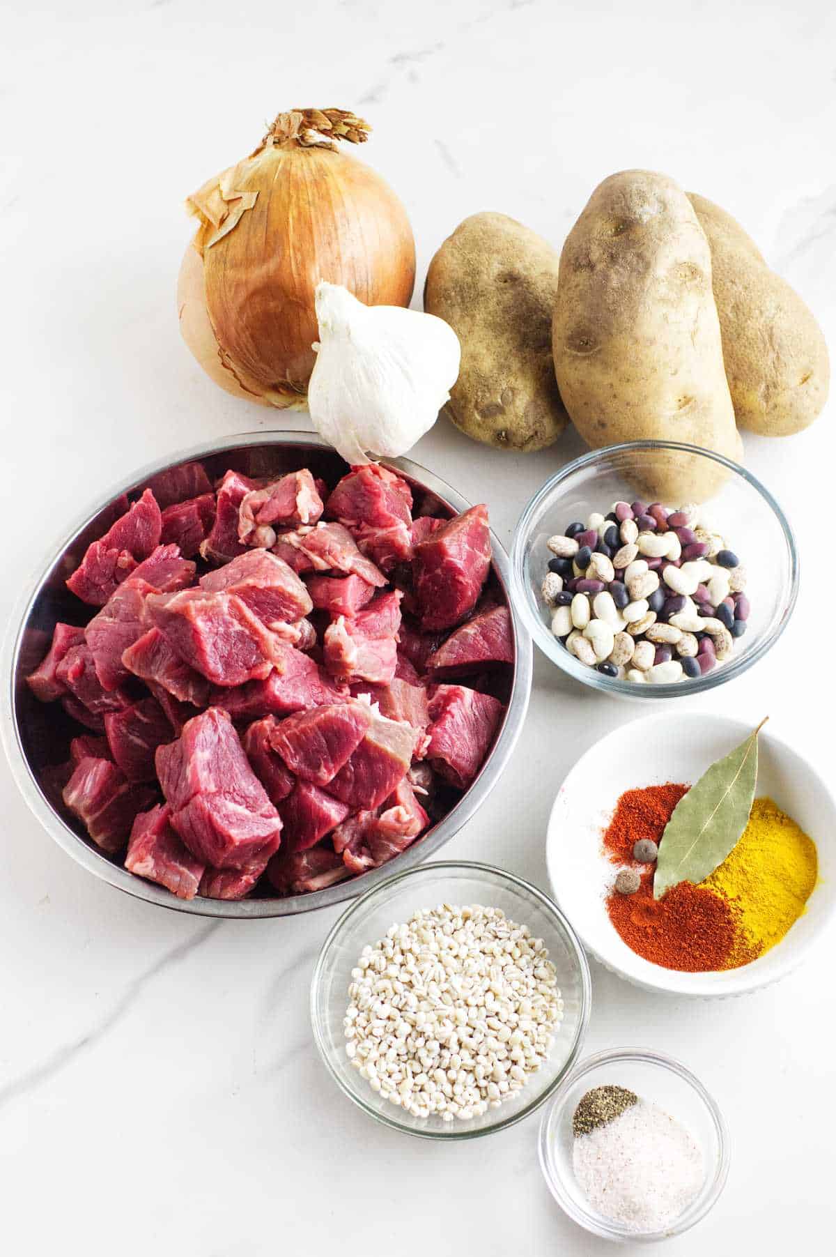 ingredients for a beef and barley cholent.