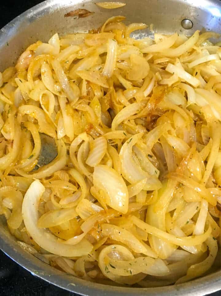 sauteeing onions in a skillet.