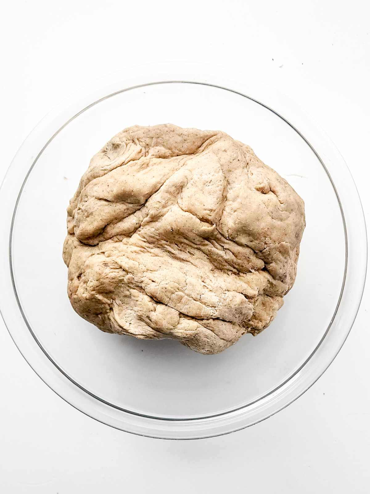 Dough rising in a bowl.