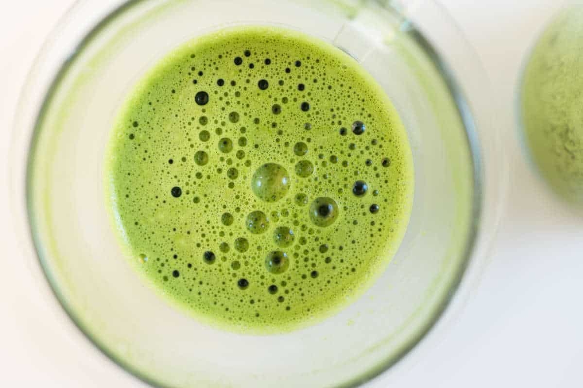 preparing powdered matcha for ice cream.