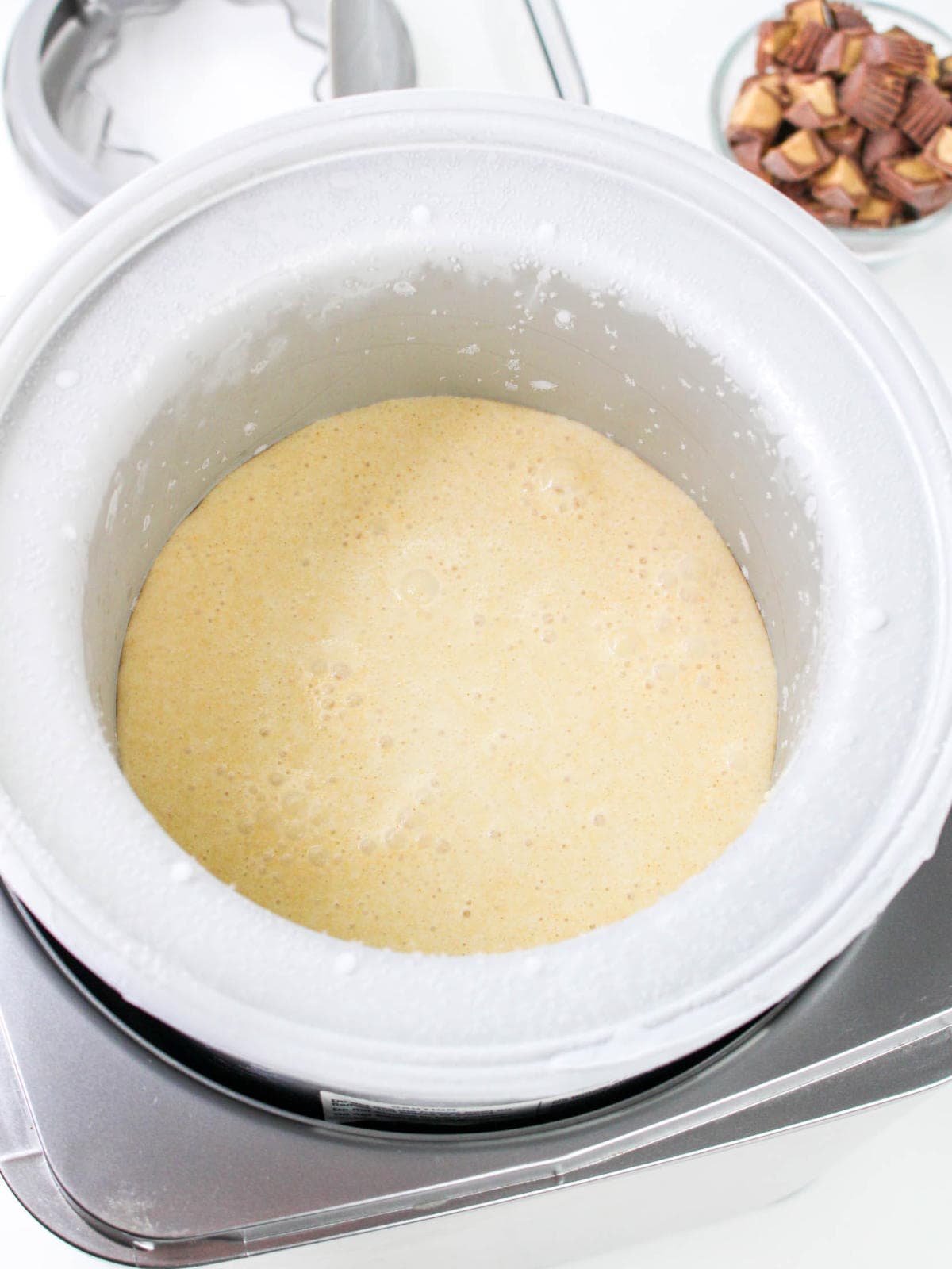 Peanut butter ice cream poured into a frozen Cuisinart freezer bowl.