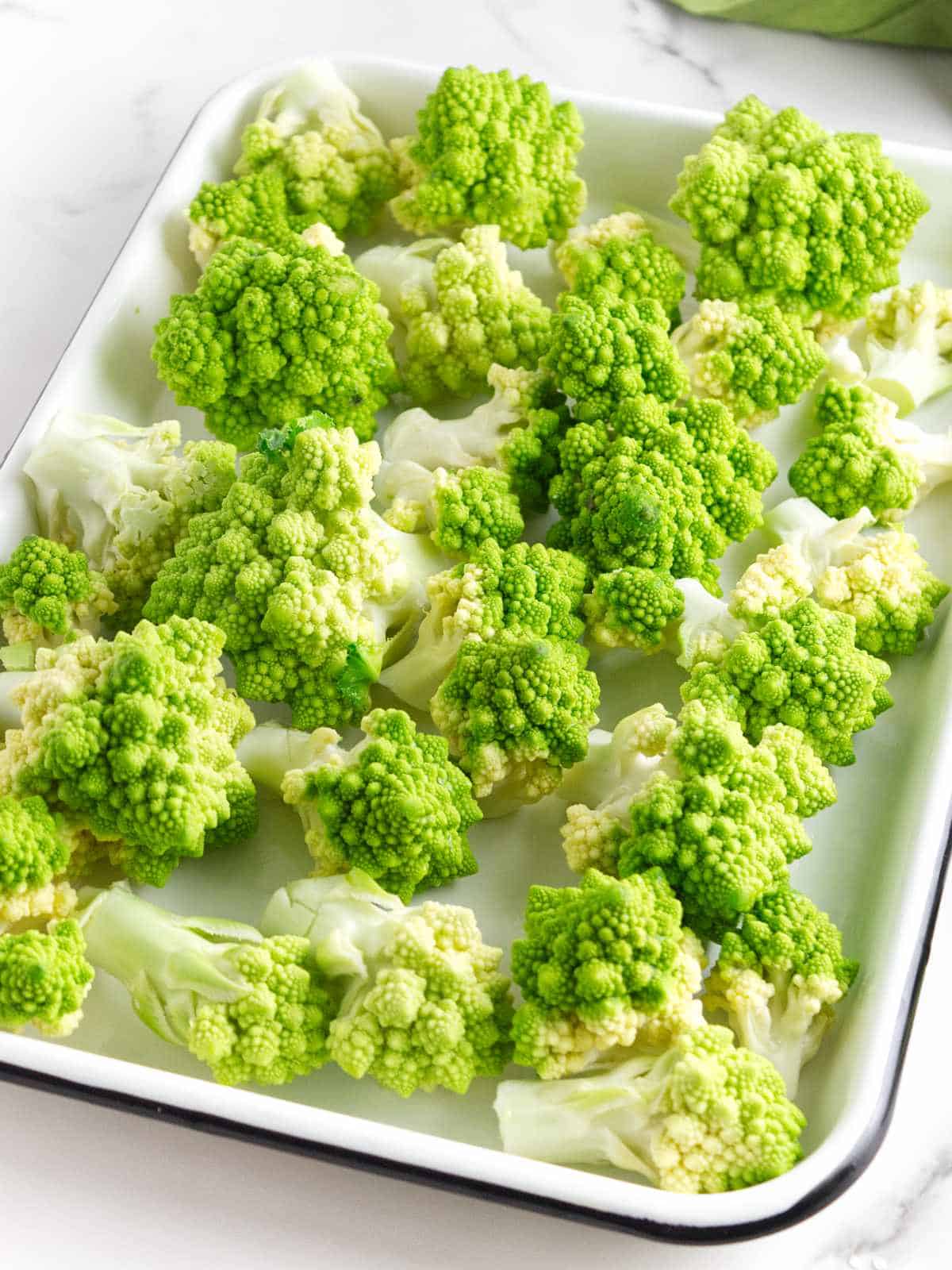 romanesco florets on a baking sheet.