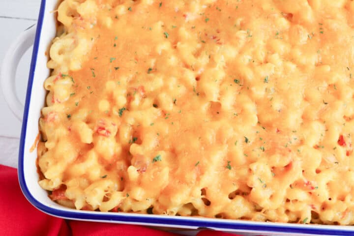 Oven baked rotel mac and cheese in a casserole.