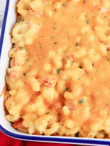 Oven baked rotel mac and cheese in a casserole.