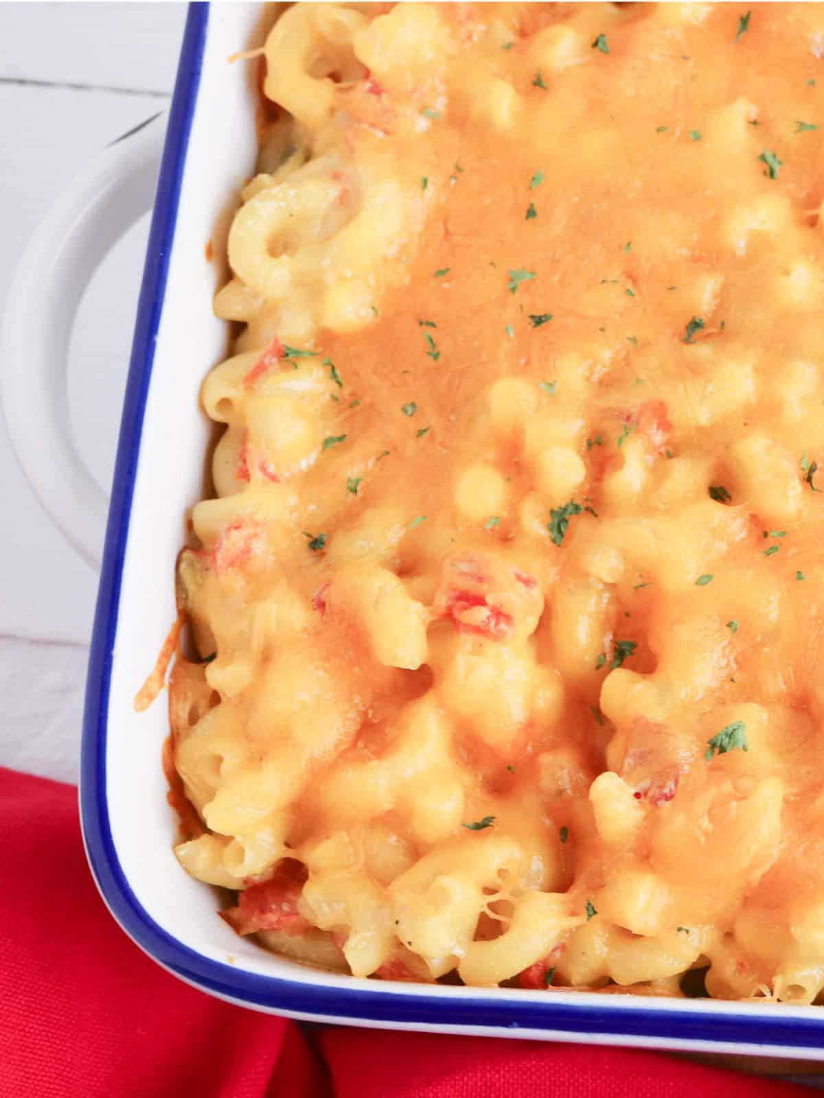 Oven baked rotel mac and cheese in a casserole.