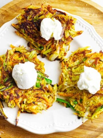 sweet potato latkes with sour cream topping.