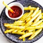 white sweet potato fries with ketchup.