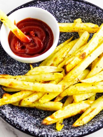 white sweet potato fries with ketchup.