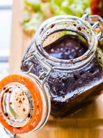 balsamic herb vinaigrette in a bail storage jar.