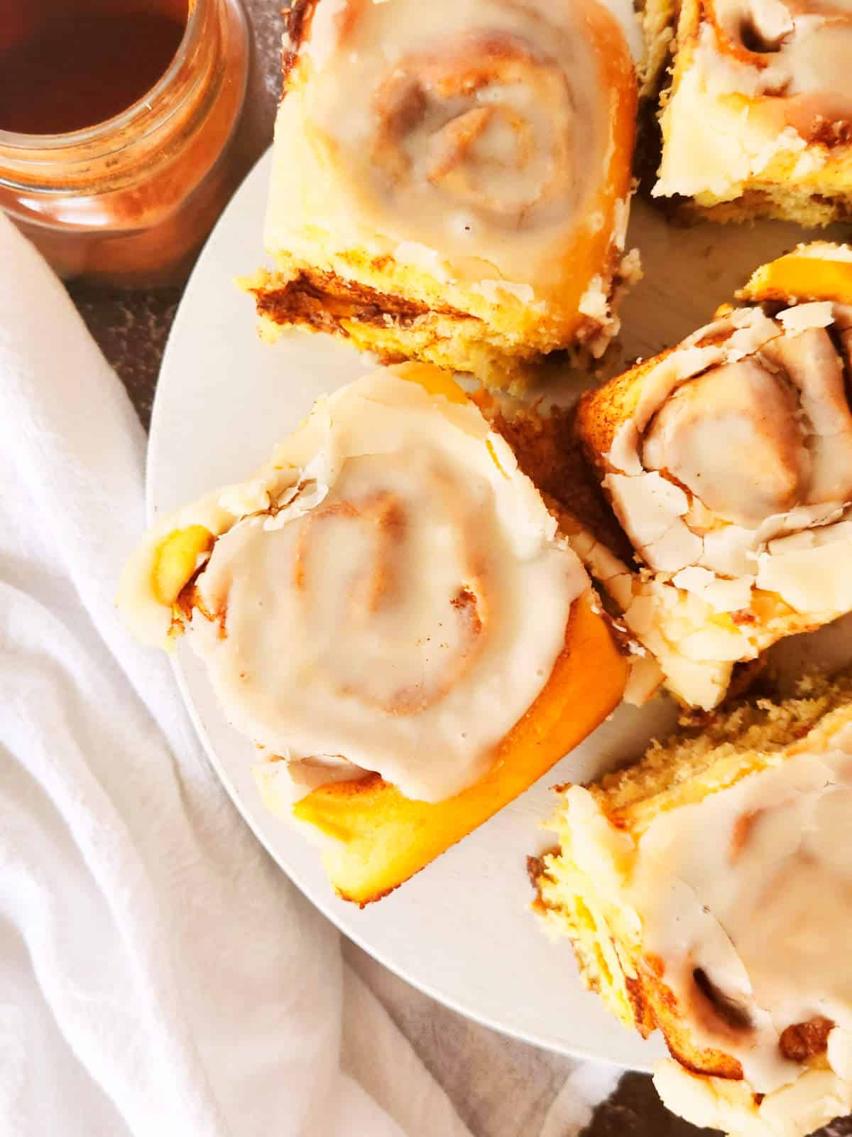 baked cinnamon rolls on a plate.