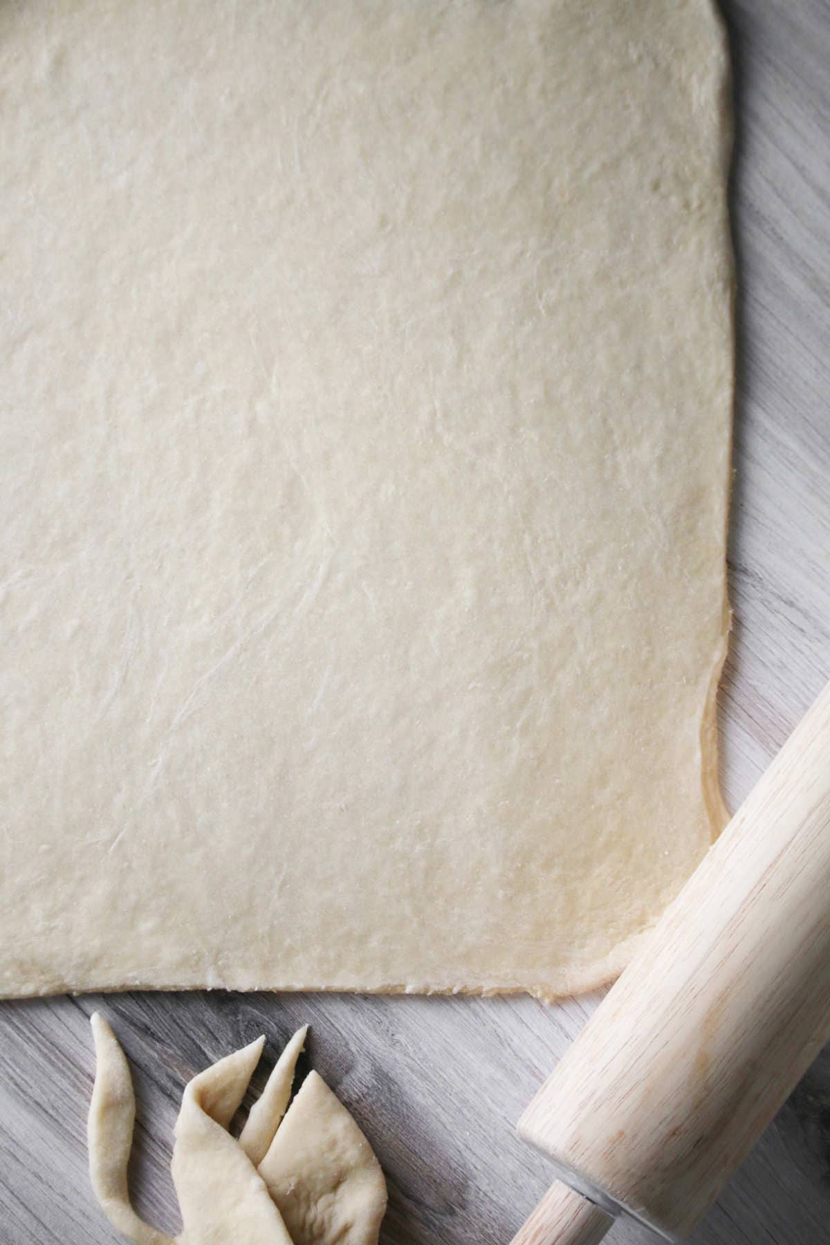 rectangle of sourdough cinnamon roll dough.