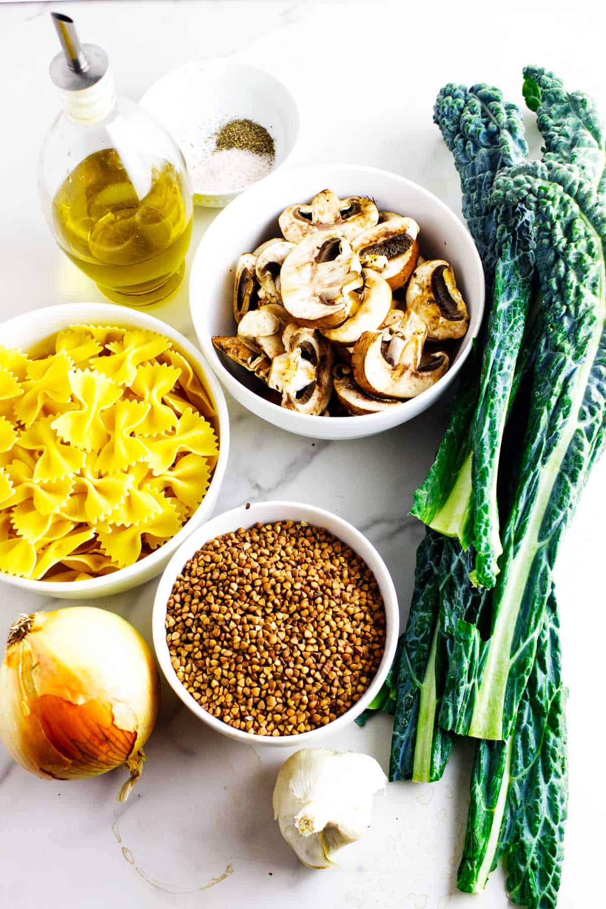 ingredients for making kasha varnishkes with kale and mushrooms.