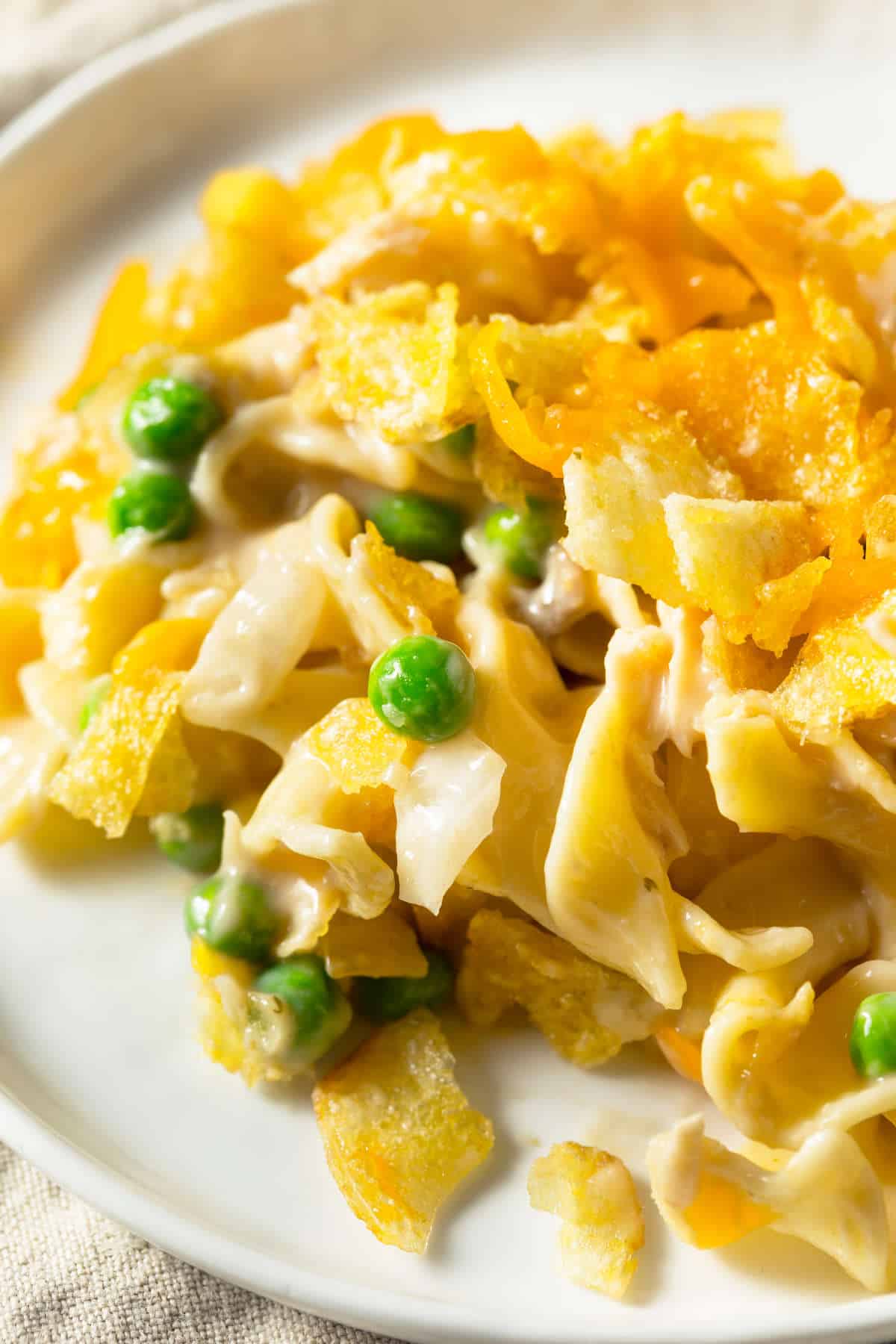 Homemade Tuna Noodle Kugel with Peas and Egg Noodles.