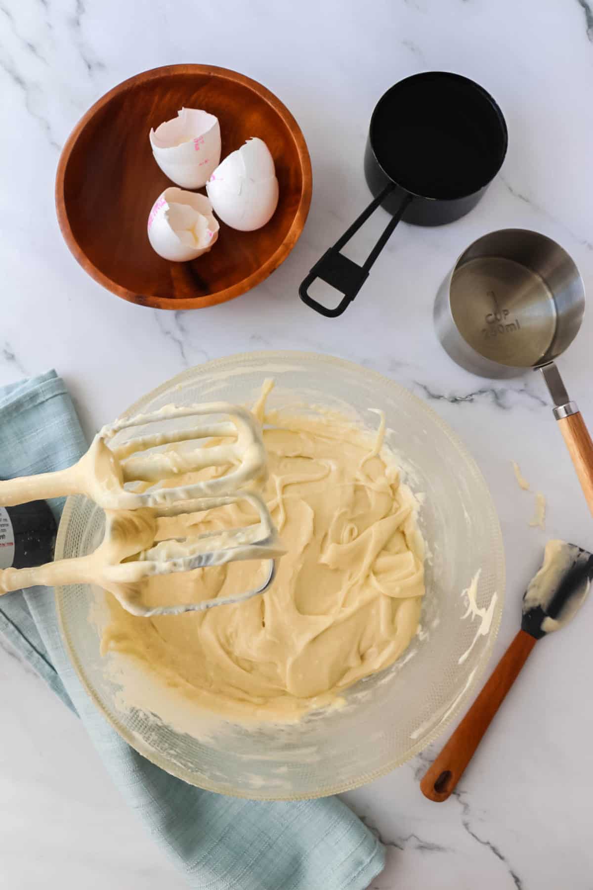 mixing vanilla cake batter.