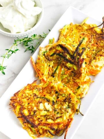 zucchini latkes with carrot and feta cheese.