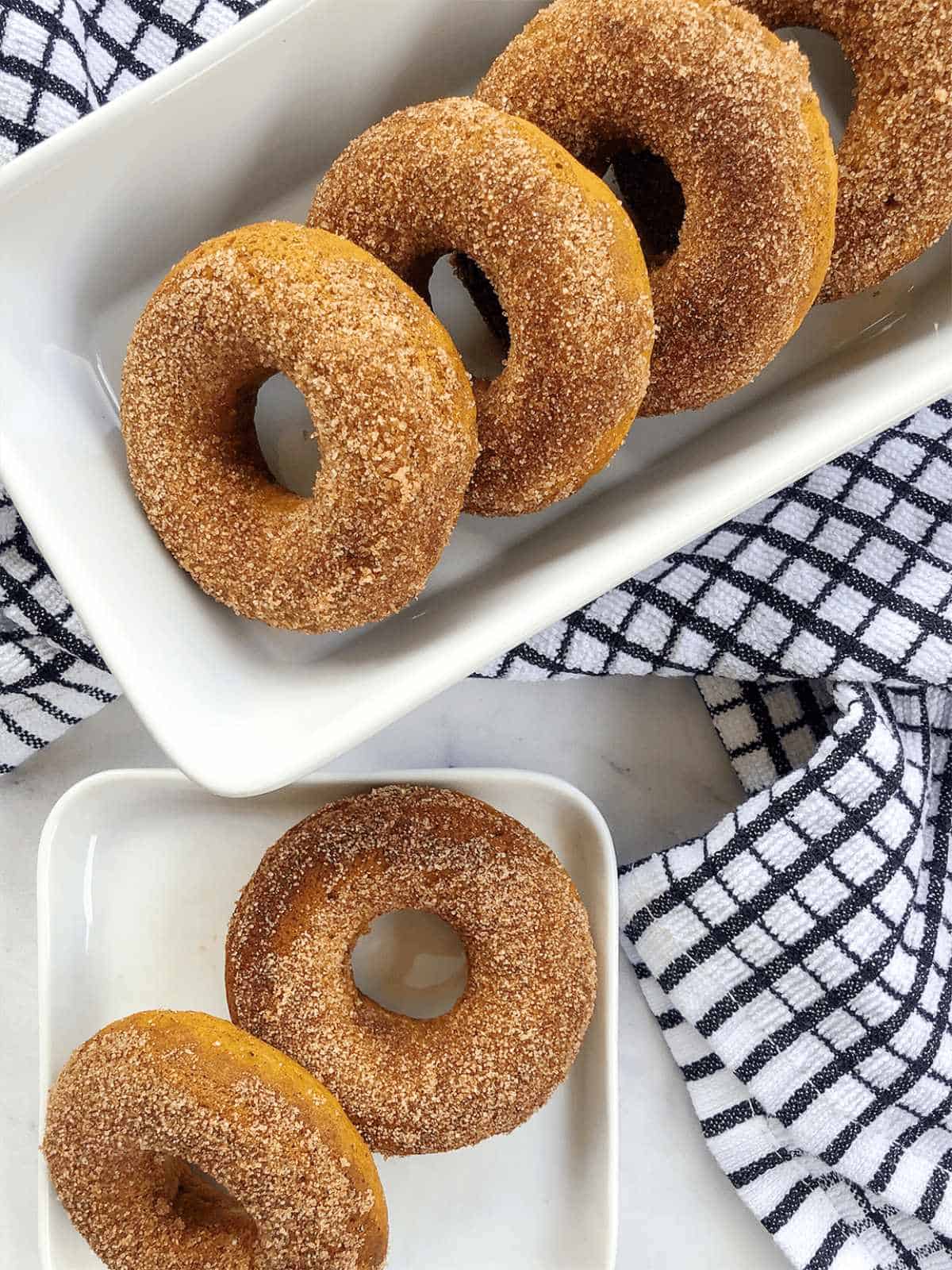 easy baked pumpkin donuts with cinnamon sugar coating.