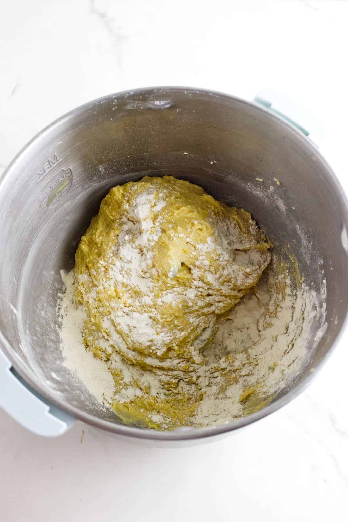 Additional flour added to sticky Rosca de Reyes dough before kneading.
