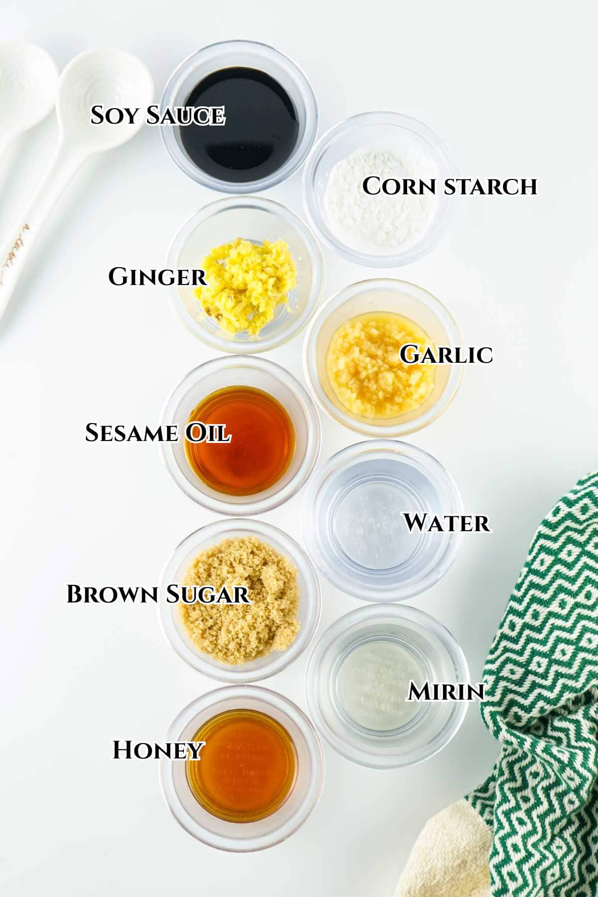 Ingredients for teppanyaki sauce including soy sauce, garlic, ginger, sesame oil, mirin, and brown sugar.