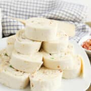 A plate of delicious bacon ranch pinwheels, perfectly rolled in soft tortillas.