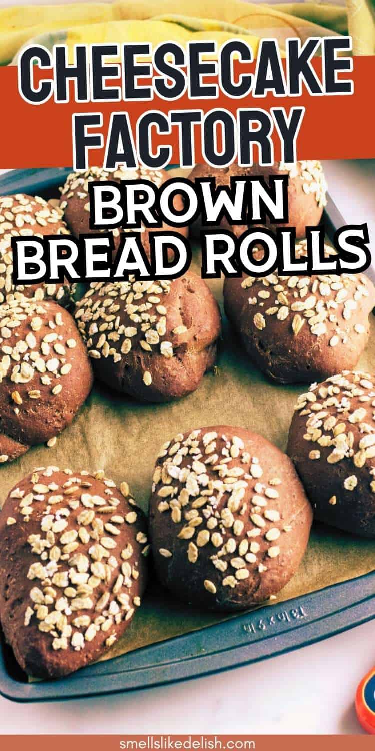 This copycat Cheesecake Factory Brown Bread Rolls recipe makes soft, slightly sweet dark dinner rolls topped with oats and perfect with butter.