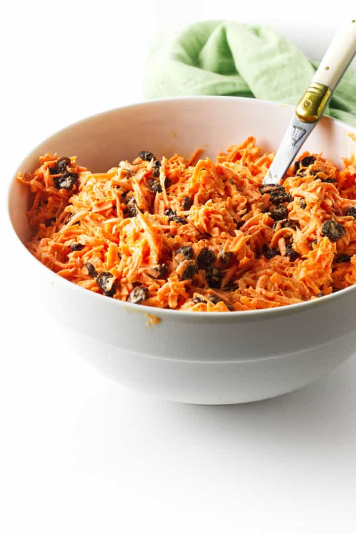 Original Chick-fil-A carrot raisin salad in a white bowl.