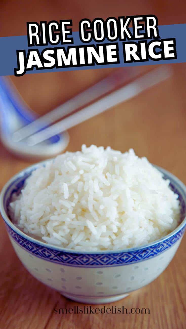 A bowl of fluffy white jasmine rice sits on a wooden surface, with a blue-patterned rim on the bowl. Chopsticks rest in the background. Text overlay reads