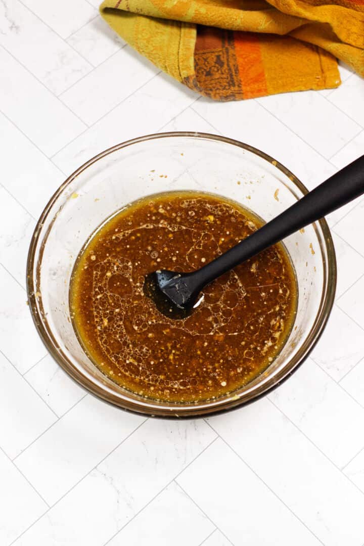 Japanese steakhouse ginger dressing stirred until smooth and well combined in a glass bowl.