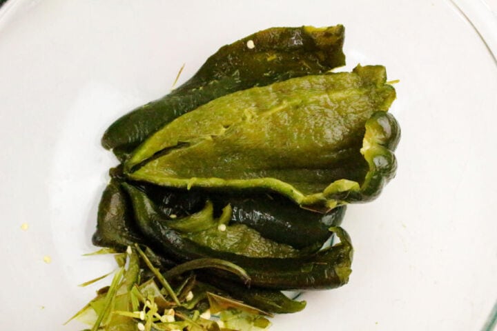 Peeled roasted poblano pepper with stem, seeds, and skin removed.