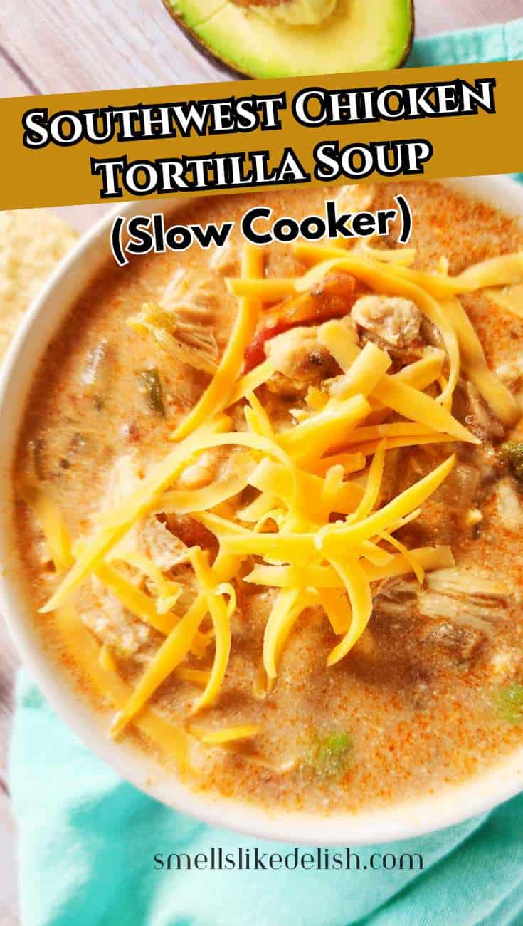 Southwest chicken tortilla soup with shredded cheese and tortilla strips in a bowl.