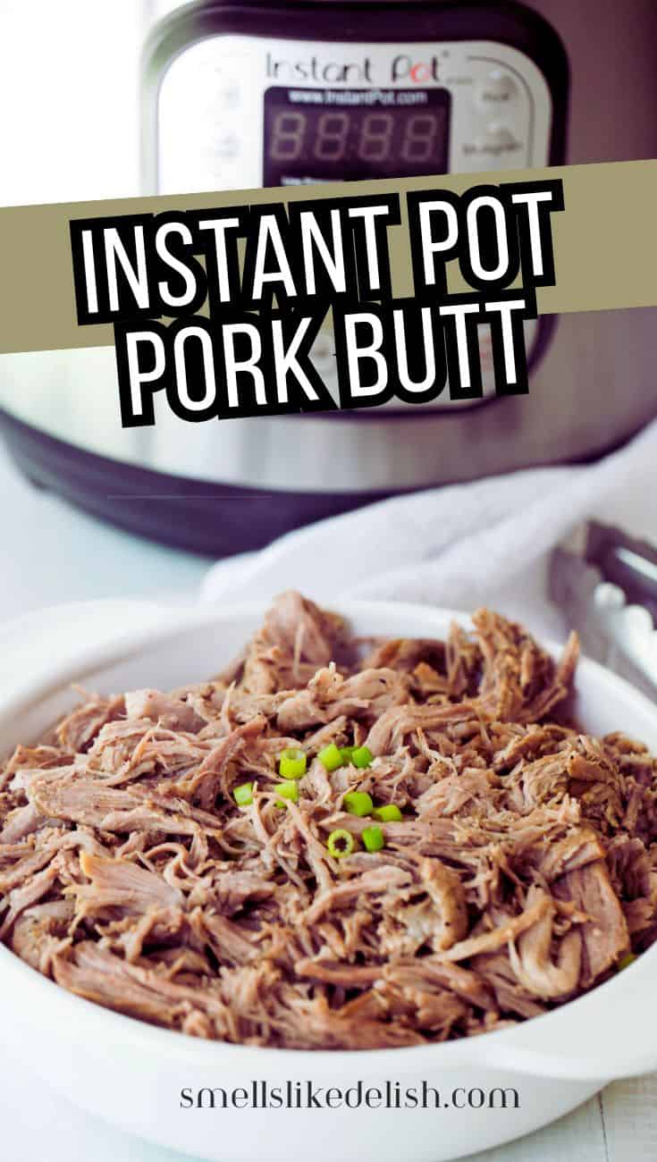 Shredded Instant Pot pork butt served in a white bowl with sliced green onions.
