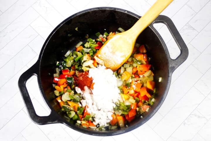 Flour and seasonings stirred into sautéed vegetables to thicken Panera Summer Corn Chowder.