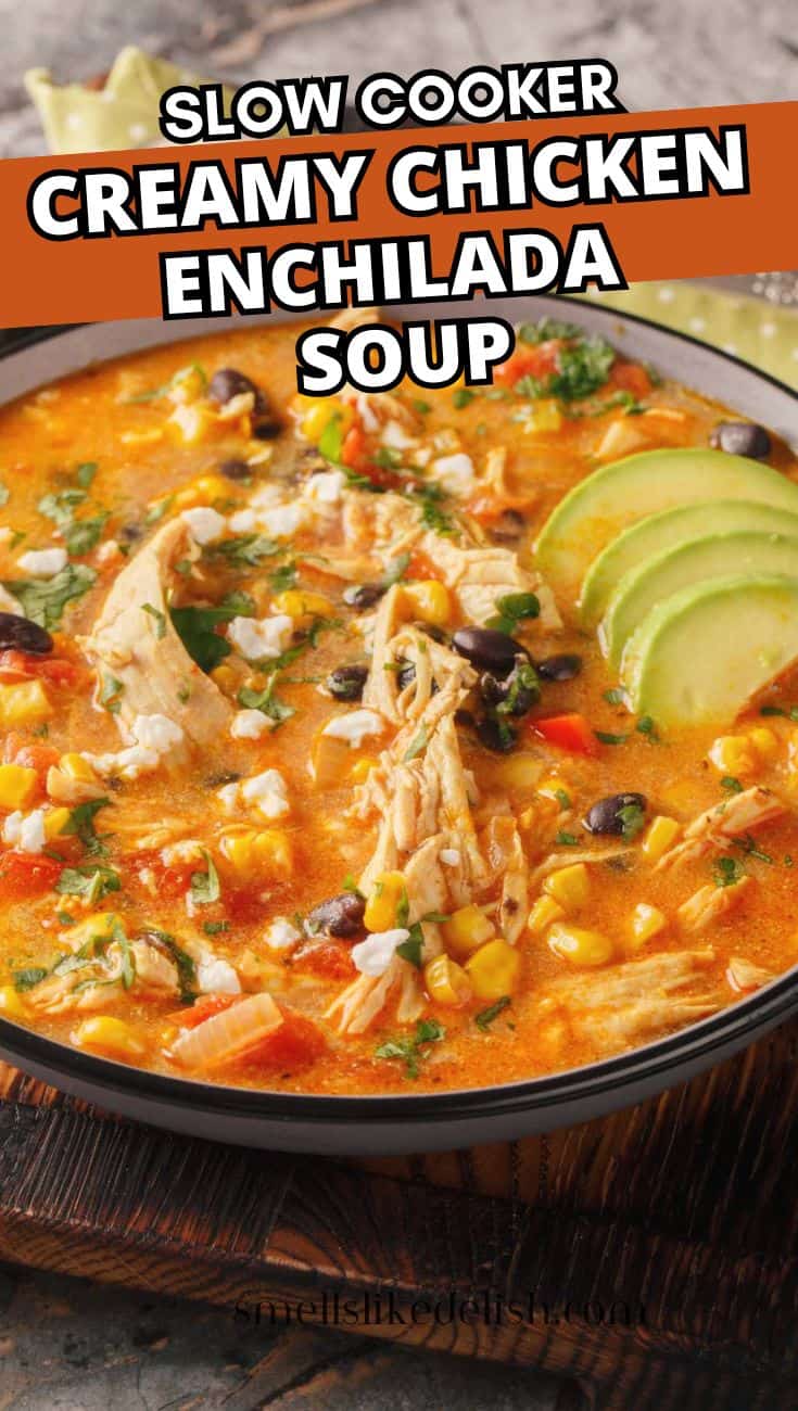 Creamy chicken enchilada soup with avocado, black beans, corn, shredded chicken, and herbs.