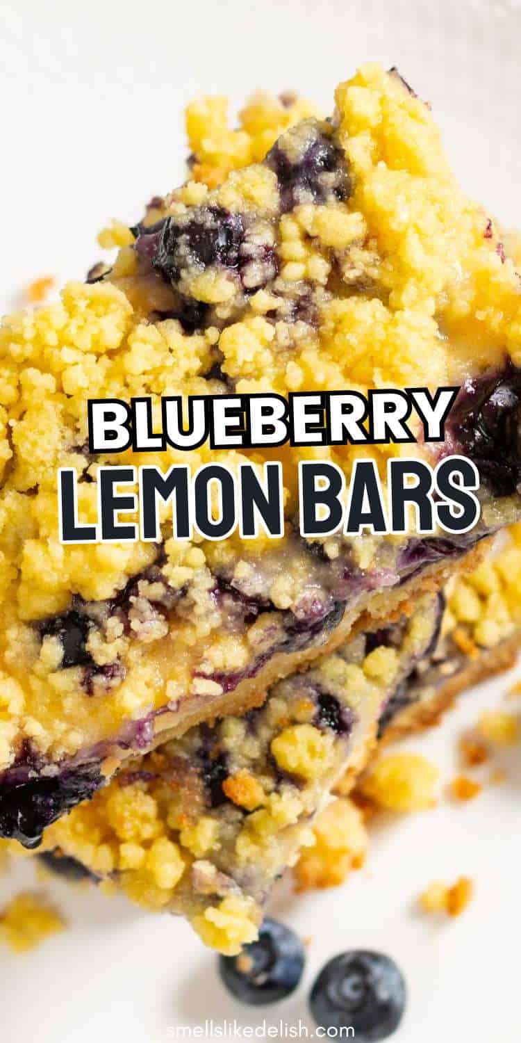 Two blueberry lemon bars with a crumbly topping and visible blueberries are stacked on a white plate, with "BLUEBERRY LEMON BARS" text over the dessert.