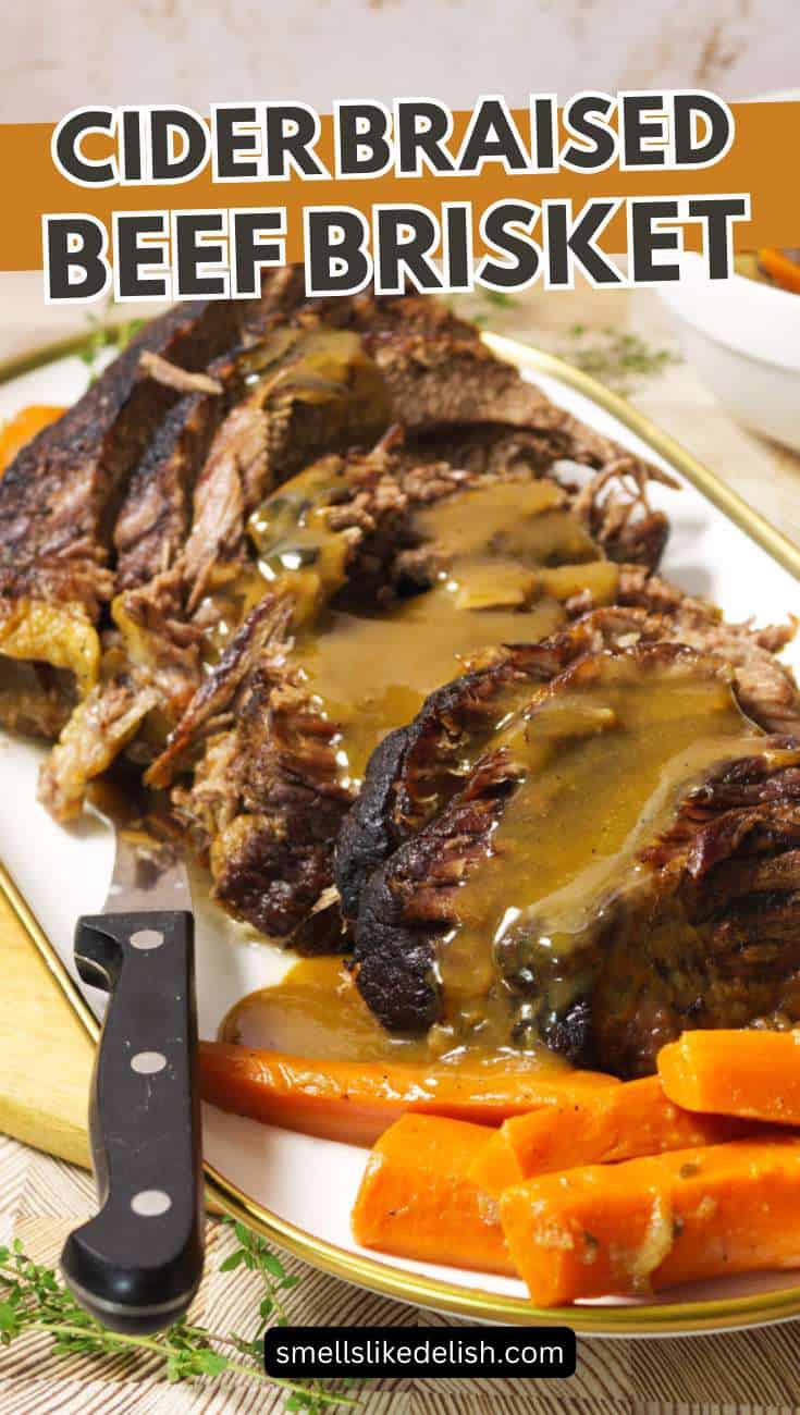 Sliced beef brisket with gravy and carrots on a white platter, black-handled knife beside it, and "Cider Braised Beef Brisket" text overlay.