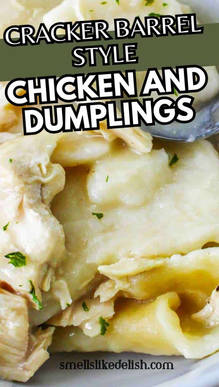 Plate of Cracker Barrel style chicken and dumplings in creamy sauce with parsley.