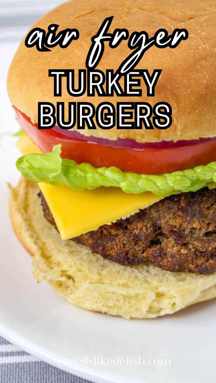 Turkey burger with lettuce, tomato, and cheddar on a bun. Text reads