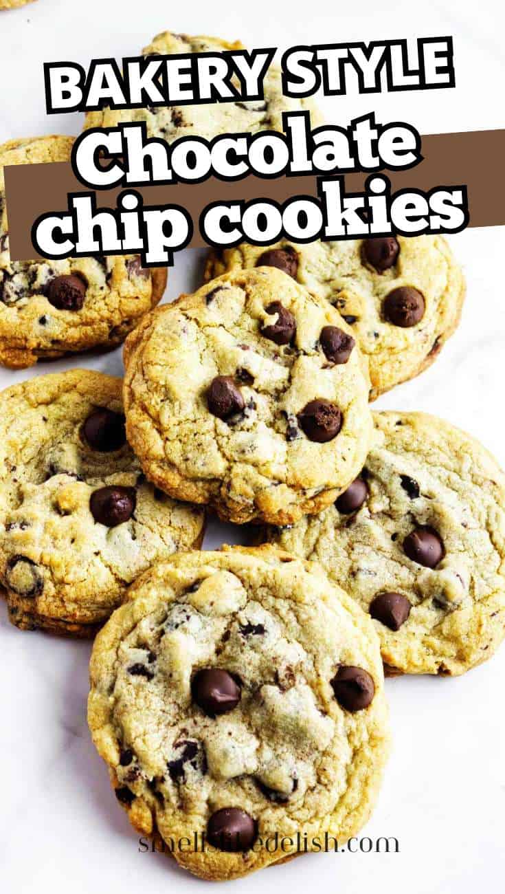 Golden-brown chocolate chip cookies stacked on a white surface, with bold text above reading
