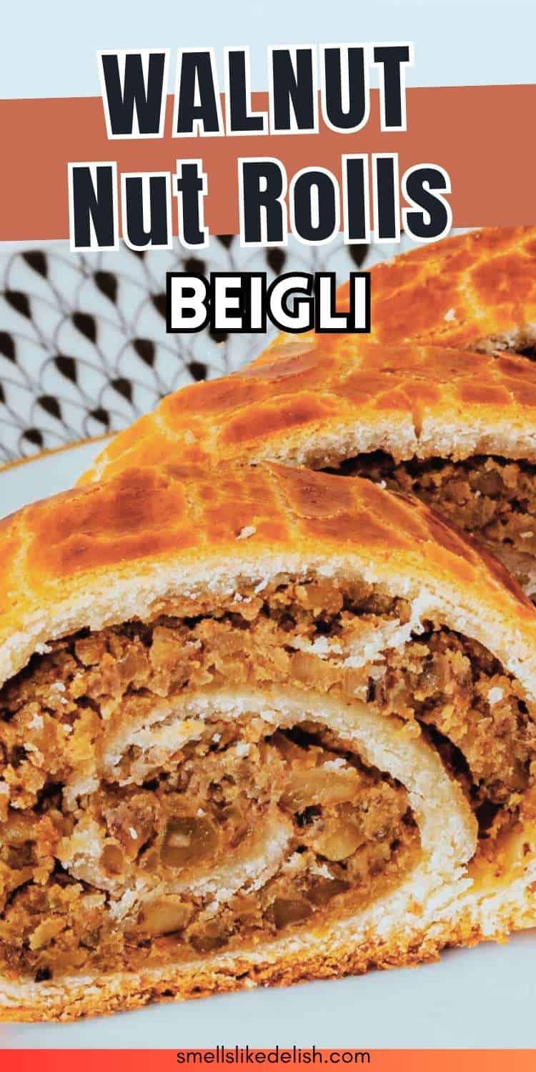 Sliced walnut nut rolls (beigli) with golden, flaky pastry and walnut filling on a decorative plate. Text: