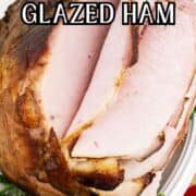 Bourbon maple glazed ham slices on a white platter with parsley, “Bourbon Maple Glazed Ham” in bold at the top.