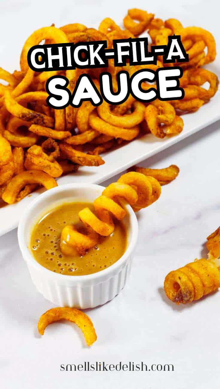 Curly fries on a white plate with Chick-fil-A sauce, one fry dipped. Text says