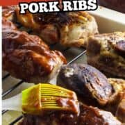 Boneless pork ribs on a wire rack, some coated with barbecue sauce and a yellow brush. Text overlay: “Country Style Boneless Pork Ribs.” Sauce jar in the top right corner.