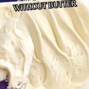Creamy white frosting spread with a spatula, with text “Cream Cheese Frosting Without Butter” and the website “smellslikedelish.com” at the bottom.