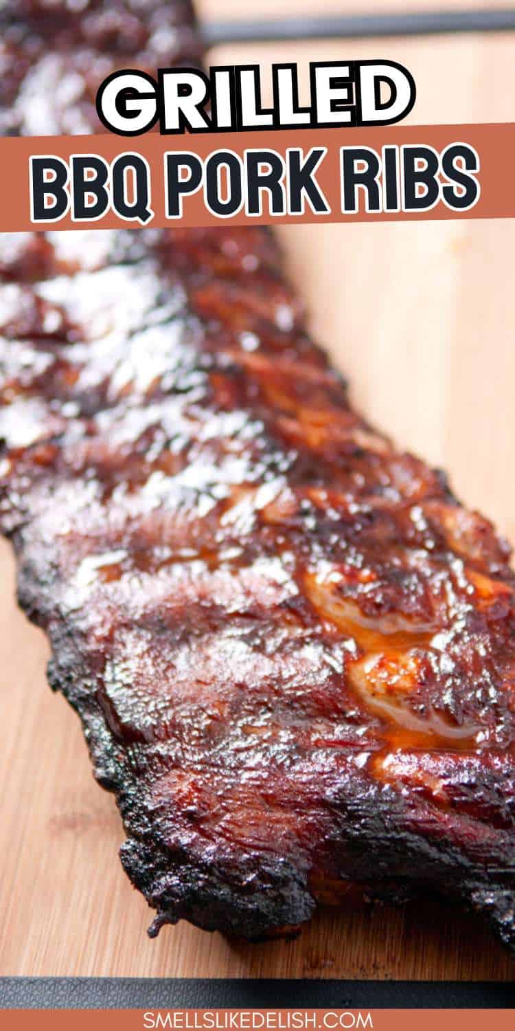 Close-up of juicy, glazed BBQ pork ribs with a dark, crispy exterior on wood, text overlay says