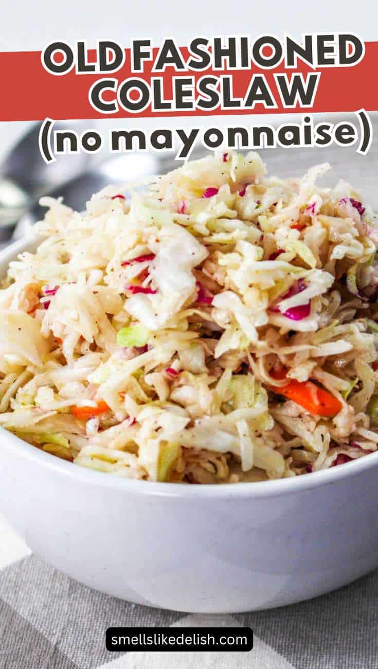 White bowl of traditional shredded cabbage and carrot coleslaw, labeled