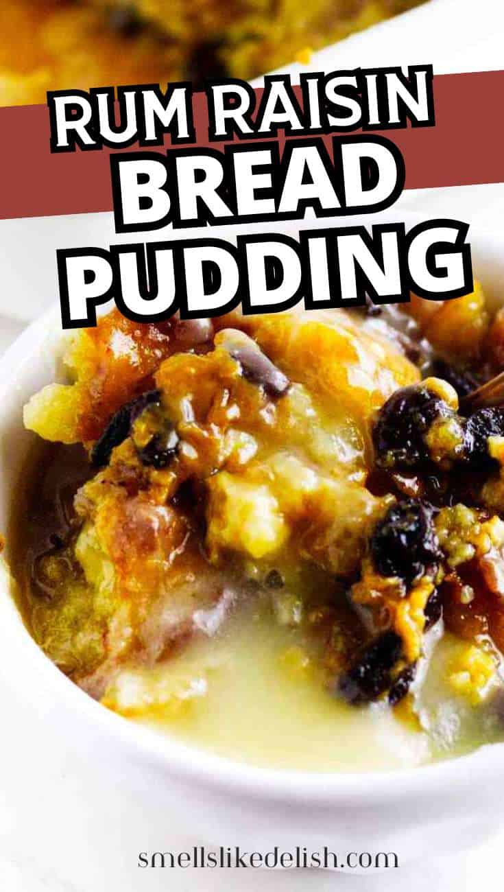 Rum raisin bread pudding in a white bowl with raisins and sauce,