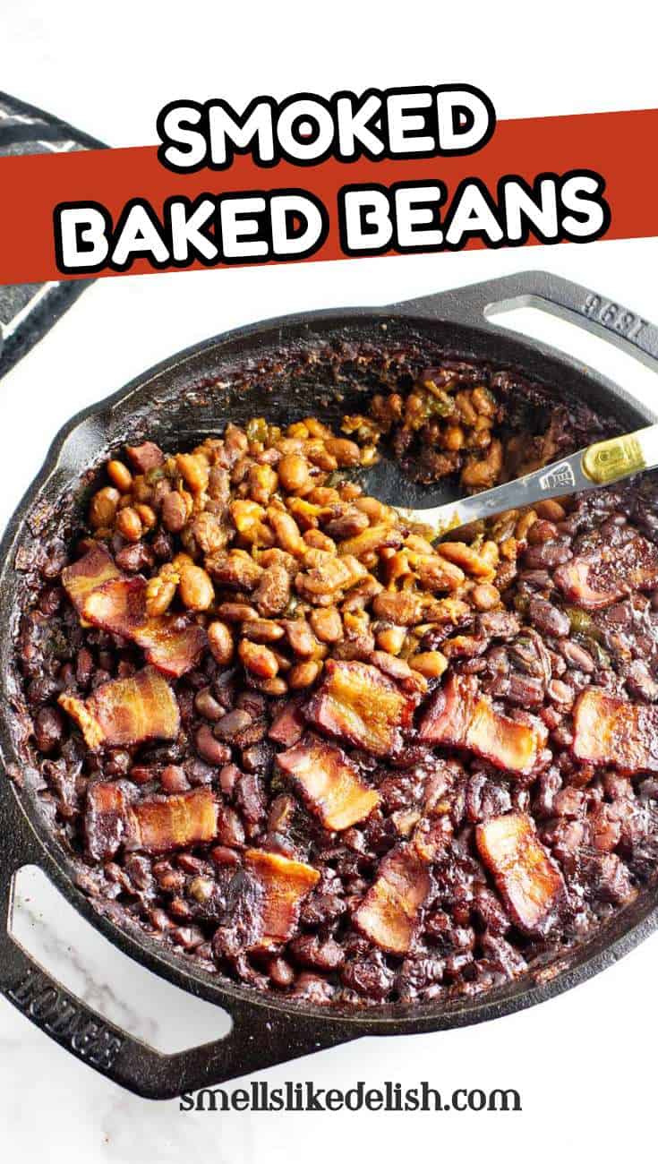 Cast iron skillet of smoked baked beans with bacon on top, some scooped out with a spoon. Text: