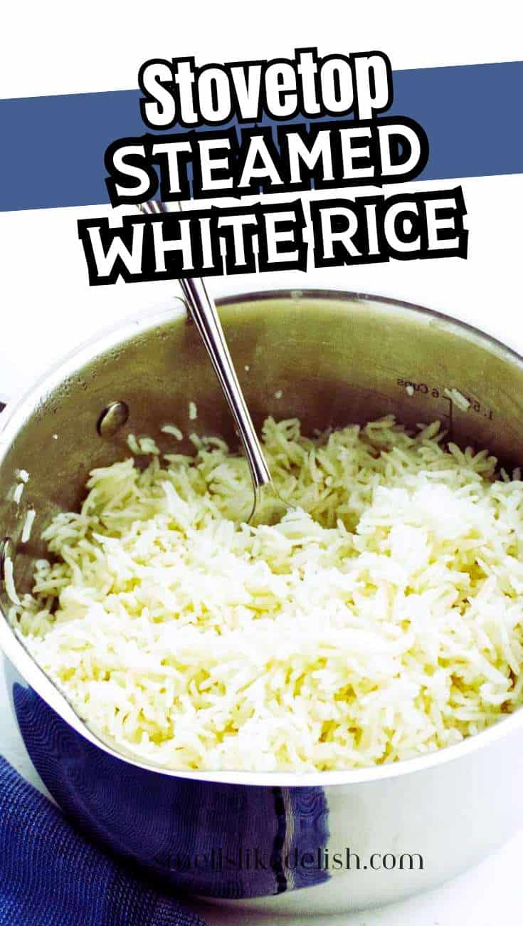 Pot of steamed white rice with serving spoon, labeled